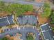 Bird's eye view of the property showing parking, landscaping, and nearby street access at 23 Chelsea Ct, Avondale Estates, GA 30002