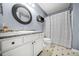 Bathroom featuring a shower/tub combo, updated vanity, and modern fixtures at 23 Chelsea Ct, Avondale Estates, GA 30002