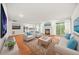 Spacious living room with fireplace and access to balcony at 23 Chelsea Ct, Avondale Estates, GA 30002