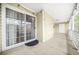 Spacious covered patio area, perfect for outdoor entertaining and relaxation at 23 Chelsea Ct, Avondale Estates, GA 30002