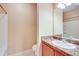 Bathroom vanity with a sink and mirror, featuring a shower and toilet at 1250 Parkwood Se Cir # 1004, Atlanta, GA 30339