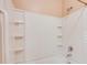 Tile surround shower-tub combination with built-in shelving at 1250 Parkwood Se Cir # 1004, Atlanta, GA 30339