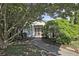 View of home's front door with landscaped yard at 1250 Parkwood Se Cir # 1004, Atlanta, GA 30339