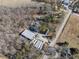 Aerial view of property showing large building, road, and surrounding land at 200 Heath Rd, Carrollton, GA 30116