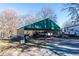 Spacious carport shelters multiple vehicles and equipment at 200 Heath Rd, Carrollton, GA 30116