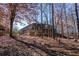 Metal building with deck nestled in a wooded area at 200 Heath Rd, Carrollton, GA 30116