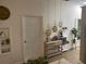 Stylish home bar with hanging lanterns, liquor, and a sleek console at 200 Heath Rd, Carrollton, GA 30116