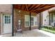 Private patio with brick walls and seating at 2858 Overlook Trce, Atlanta, GA 30324