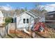 Gray house exterior with red deck and screened porch at 1519 Mcpherson Se Ave, Atlanta, GA 30316