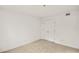 Bedroom featuring white walls and carpet, with double door closet at 1204 Riverview Se Dr, Marietta, GA 30067