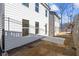 Small backyard with a patio and retaining wall at 714 Smokey Quartz Way, Kennesaw, GA 30144