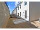 Small backyard with a patio and retaining wall at 714 Smokey Quartz Way, Kennesaw, GA 30144