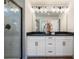 Modern bathroom featuring double sink vanity with white cabinets and framed glass shower at 714 Smokey Quartz Way, Kennesaw, GA 30144