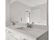 Double vanity bathroom with quartz countertop and modern faucets at 714 Smokey Quartz Way, Kennesaw, GA 30144