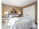 Cozy bedroom featuring a comfortable bed, stylish decor, and natural light at 714 Smokey Quartz Way, Kennesaw, GA 30144