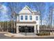 Beautiful two-story home featuring brick accents, a well-manicured lawn, and a welcoming entryway at 714 Smokey Quartz Way, Kennesaw, GA 30144