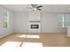 Spacious living room with hardwood floors and a modern fireplace at 714 Smokey Quartz Way, Kennesaw, GA 30144