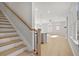 Modern staircase with light wood and metal accents at 714 Smokey Quartz Way, Kennesaw, GA 30144