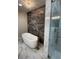 Modern bathroom featuring a standalone tub and glass shower at 1706 Alvarado Sw Ter, Atlanta, GA 30310