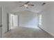 Spacious main bedroom featuring vaulted ceiling, neutral colors, and carpeted floors at 1886 Carisbrook Pl, Austell, GA 30168