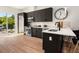 Contemporary kitchen featuring dark cabinetry and an island at 2199 Lenox Ne Rd # 14, Atlanta, GA 30324