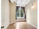 Bright bedroom with hardwood floors and large window at 32 Peachtree Nw St # 308, Atlanta, GA 30303