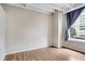 Spacious bedroom with hardwood floors and large window at 32 Peachtree Nw St # 308, Atlanta, GA 30303