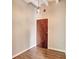 Elegant entryway with hardwood floors and unique light fixture at 32 Peachtree Nw St # 308, Atlanta, GA 30303
