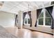 Bright living room featuring hardwood floors and large windows at 32 Peachtree Nw St # 308, Atlanta, GA 30303