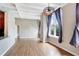 Spacious living area with hardwood floors and large windows at 32 Peachtree Nw St # 308, Atlanta, GA 30303