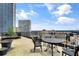 Spacious rooftop terrace with city views and seating area at 32 Peachtree Nw St # 308, Atlanta, GA 30303