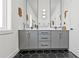 Sleek bathroom featuring double vanities and stylish tile at 2199 Lenox Ne Rd # 13, Atlanta, GA 30324