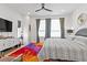 Bright bedroom featuring a large window with plenty of natural light at 2199 Lenox Ne Rd # 13, Atlanta, GA 30324