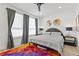 Stylish bedroom with modern decor and large windows at 2199 Lenox Ne Rd # 13, Atlanta, GA 30324