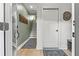 Modern entryway with green accent wall and stairs to upper level at 2199 Lenox Ne Rd # 13, Atlanta, GA 30324
