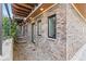 Modern townhome with brick exterior and private patio area at 2199 Lenox Ne Rd # 13, Atlanta, GA 30324