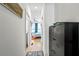 Bright hallway with light wood floors, leading to bedroom and bath at 2199 Lenox Ne Rd # 13, Atlanta, GA 30324