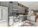 Well-equipped kitchen with modern appliances, gray cabinetry, and sleek countertops at 2199 Lenox Ne Rd # 13, Atlanta, GA 30324