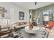 Bright living room with hardwood floors, modern decor, large windows, and a sliding glass door at 2199 Lenox Ne Rd # 13, Atlanta, GA 30324
