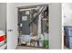 This utility closet houses essential mechanical systems, neatly organized with storage solutions at 2199 Lenox Ne Rd # 13, Atlanta, GA 30324