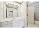 Clean bathroom with vanity and access to a tub at 135 Eagles Club Dr, Stockbridge, GA 30281