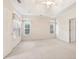 Spacious bedroom with ceiling fan and large windows at 135 Eagles Club Dr, Stockbridge, GA 30281