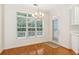 Breakfast room with hardwood floors and access to the backyard at 135 Eagles Club Dr, Stockbridge, GA 30281
