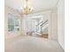 Bright dining room with hardwood floors and a chandelier at 135 Eagles Club Dr, Stockbridge, GA 30281