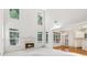 Spacious Gathering room with high ceilings, fireplace and lots of natural light at 135 Eagles Club Dr, Stockbridge, GA 30281