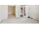 Office with French doors and carpet flooring at 135 Eagles Club Dr, Stockbridge, GA 30281