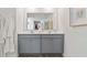 Modern bathroom features a double vanity and gray cabinets at 2458 Bayberry St, Acworth, GA 30101