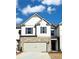 Charming townhouse featuring stone accents and gray shutters at 2458 Bayberry St, Acworth, GA 30101