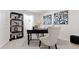 Stylish home office with dark wood desk, shelving, and a comfortable chair at 2458 Bayberry St, Acworth, GA 30101