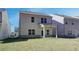 Back of the house with a backyard at 4361 Portsbrook Ave, Snellville, GA 30039